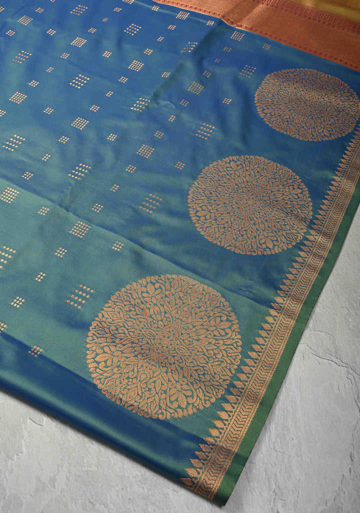 Peacock Blue Kanchi Semi Silk Saree with Zari Buttas and Mandala Motifs on Minimal Zari Border