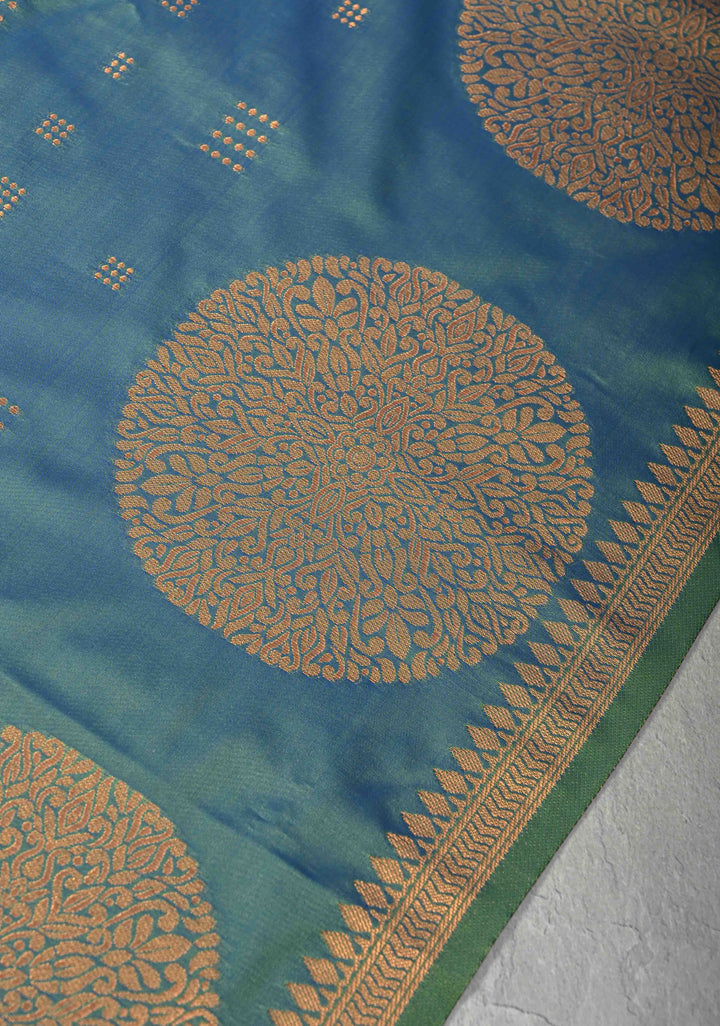 Peacock Blue Kanchi Semi Silk Saree with Zari Buttas and Mandala Motifs on Minimal Zari Border