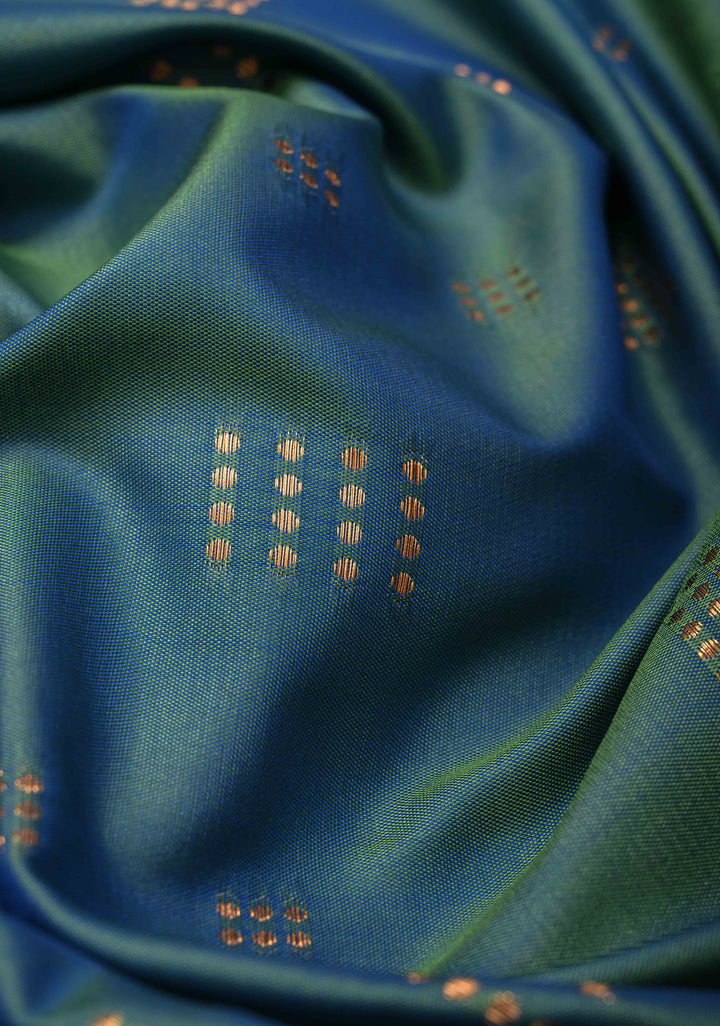 Peacock Blue Kanchi Semi Silk Saree with Zari Buttas and Mandala Motifs on Minimal Zari Border