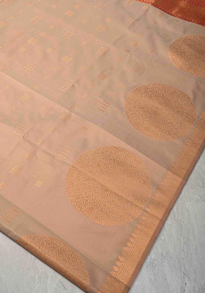 Sandstone Kanchi Semi Silk Saree with Zari Buttas and Mandala Motifs on Minimal Zari Border