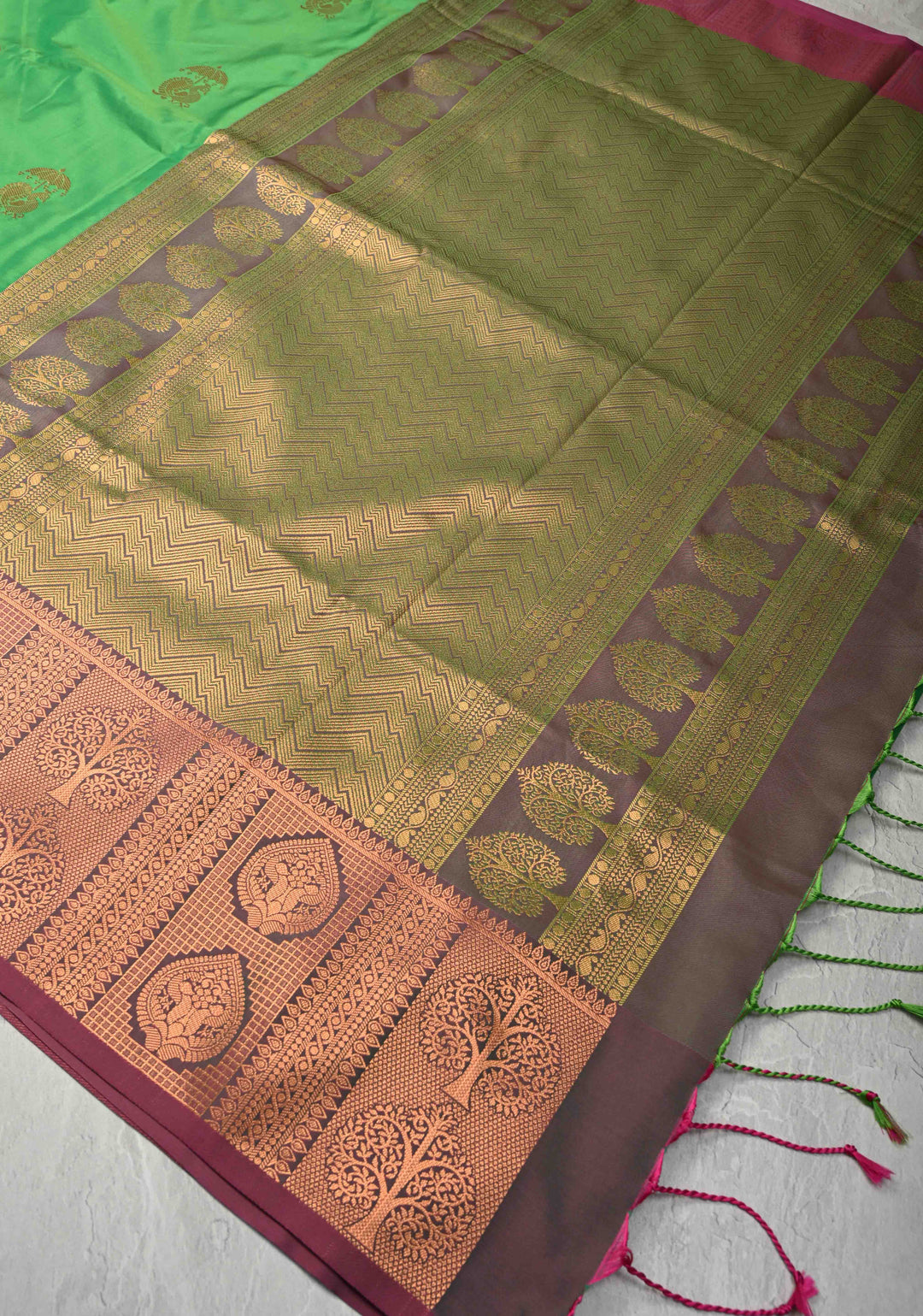 Green Kanchi Semi Silk Saree with Peacock Buttas and Contrast Zari Border