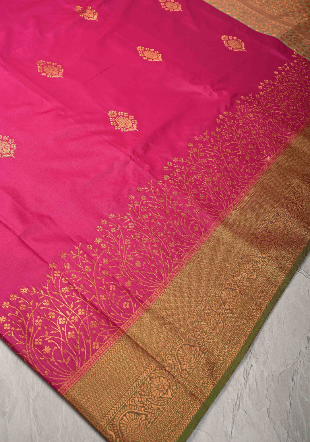 Fushsia Kanchi Semi Silk Saree with Floral Buttas and Zari Border