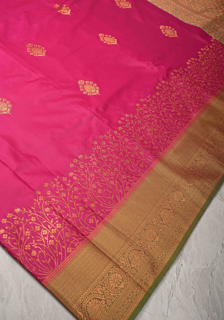 Fushsia Kanchi Semi Silk Saree with Floral Buttas and Zari Border
