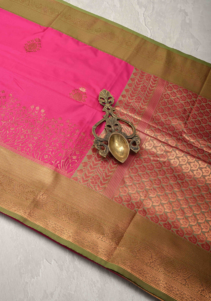 Fushsia Kanchi Semi Silk Saree with Floral Buttas and Zari Border