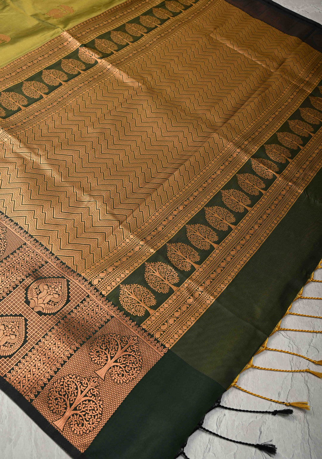 Henna Green Kanchi Semi Silk Saree with Peacock Buttas and Zari Border