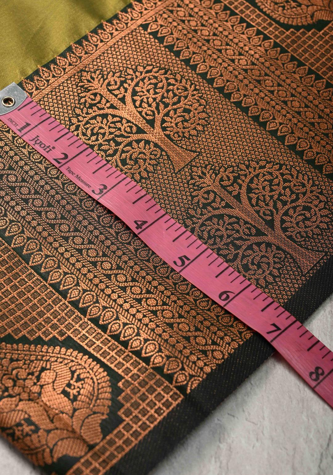 Henna Green Kanchi Semi Silk Saree with Peacock Buttas and Zari Border