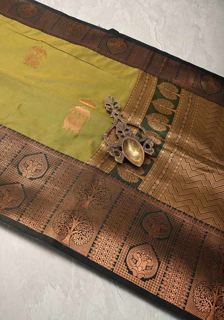 Henna Green Kanchi Semi Silk Saree with Peacock Buttas and Zari Border