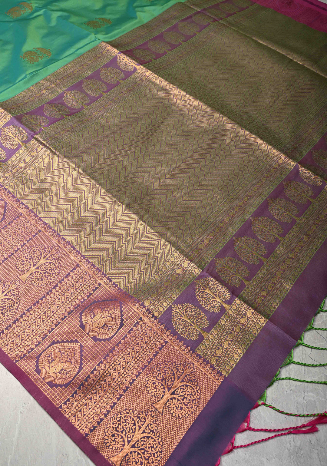 Green Dual tone Kanchi Semi Silk Saree with Peacock Buttas and Contrast Zari Border