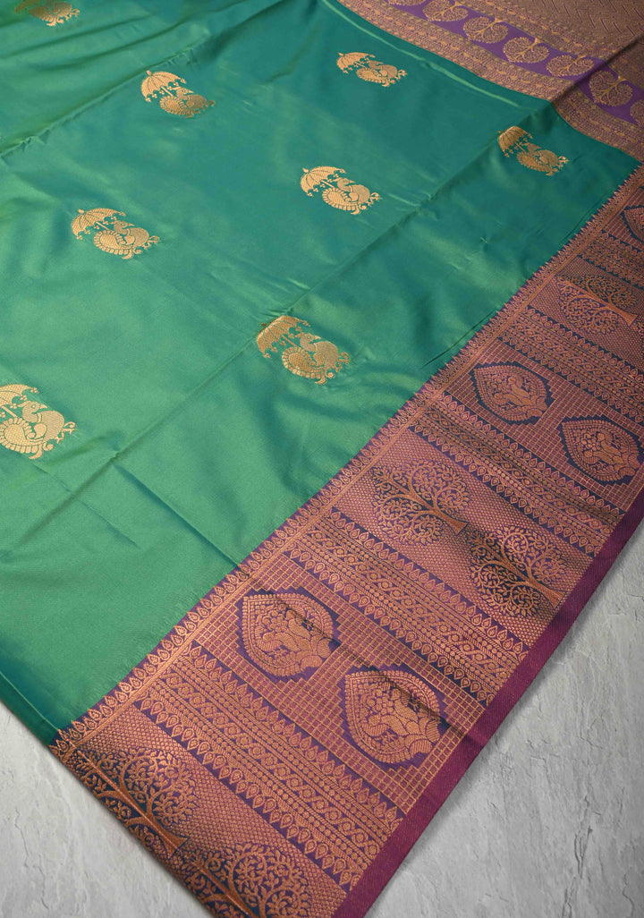 Green Dual tone Kanchi Semi Silk Saree with Peacock Buttas and Contrast Zari Border