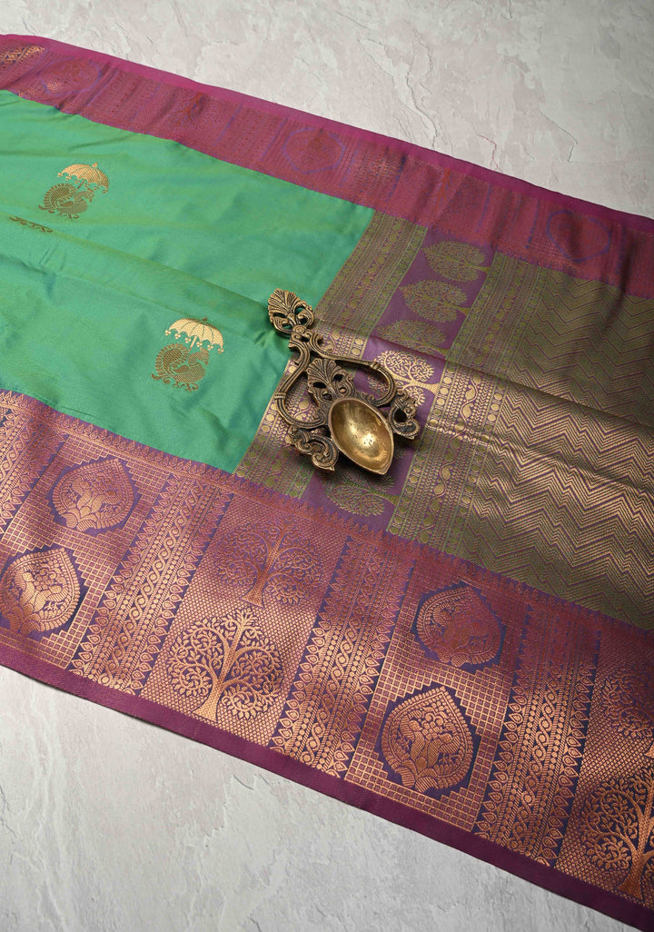 Green Dual tone Kanchi Semi Silk Saree with Peacock Buttas and Contrast Zari Border