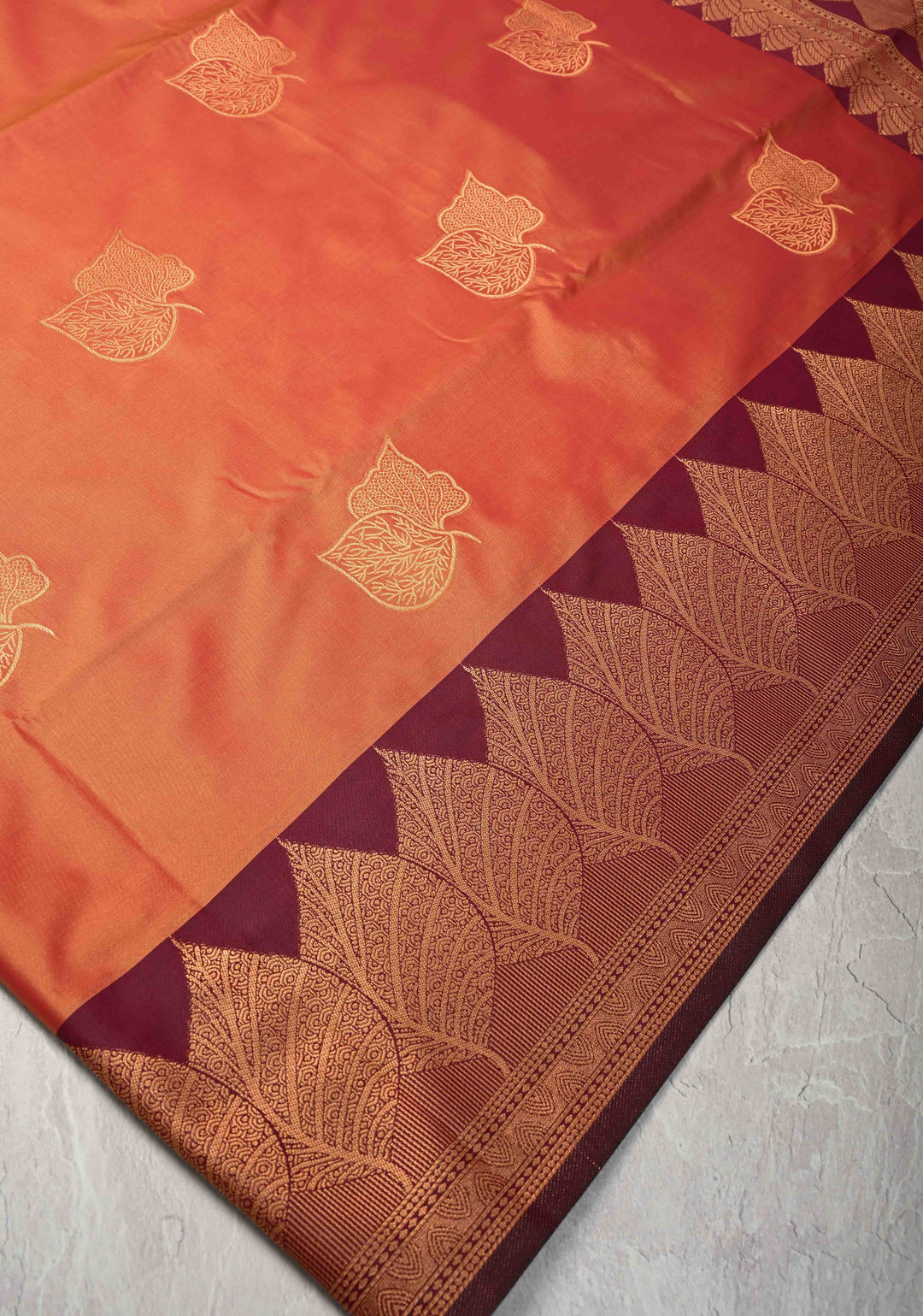 Orange Dual tone Kanchi Semi Silk Saree with Leaf Buttas and Contrast Zari Border