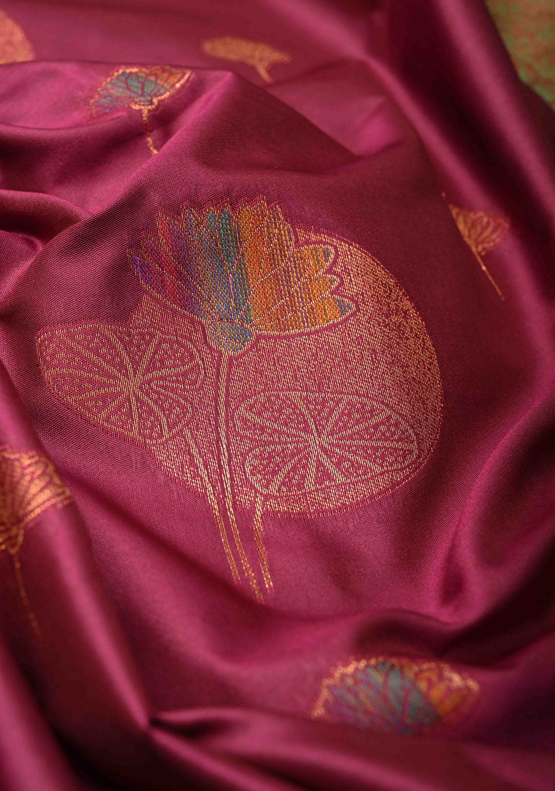 Magenta Kanchi Semi Silk Saree with Meenakar Floral Buttas and Contrast Zari Border