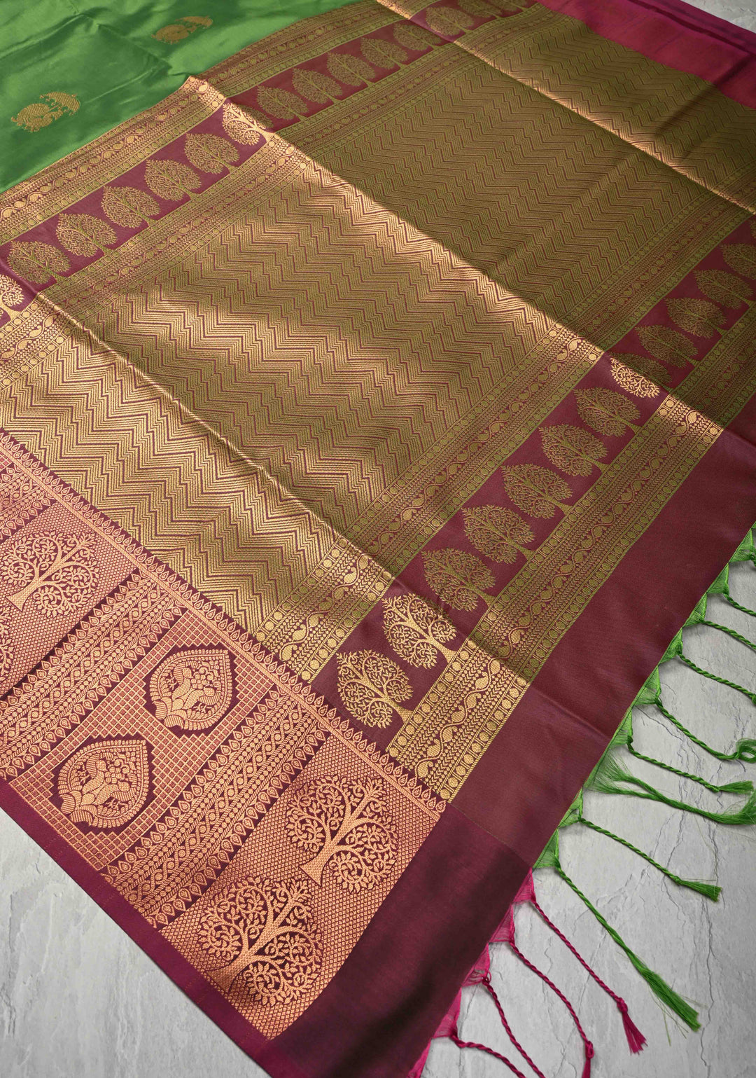 Sap Green Kanchi Semi Silk Saree with Peacock Buttas and Contrast Zari Border