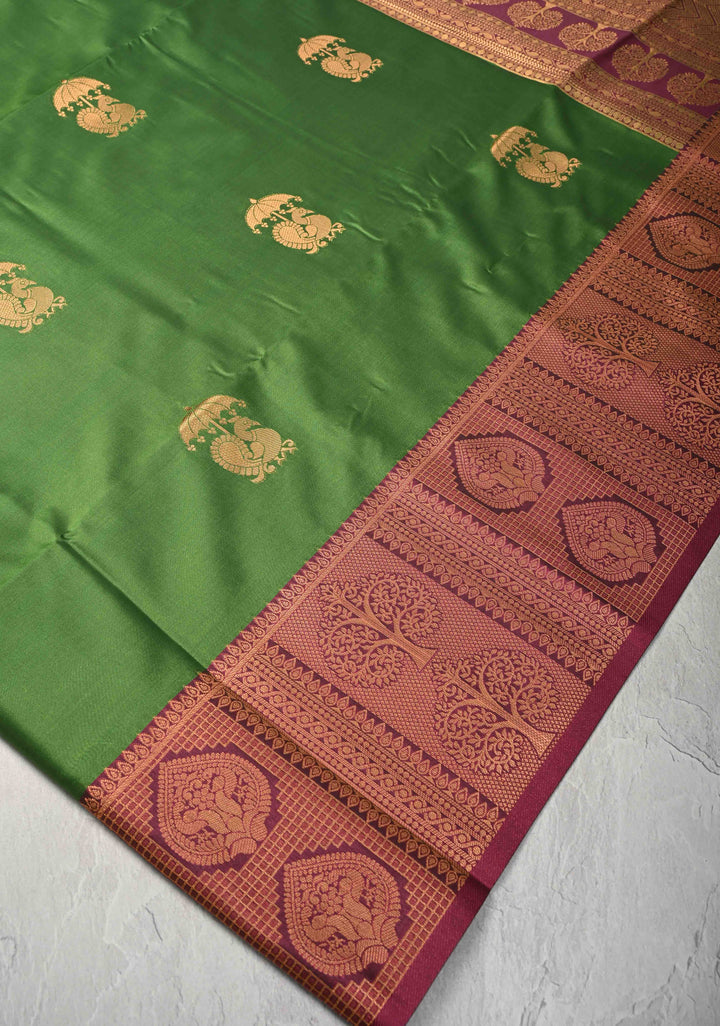 Sap Green Kanchi Semi Silk Saree with Peacock Buttas and Contrast Zari Border