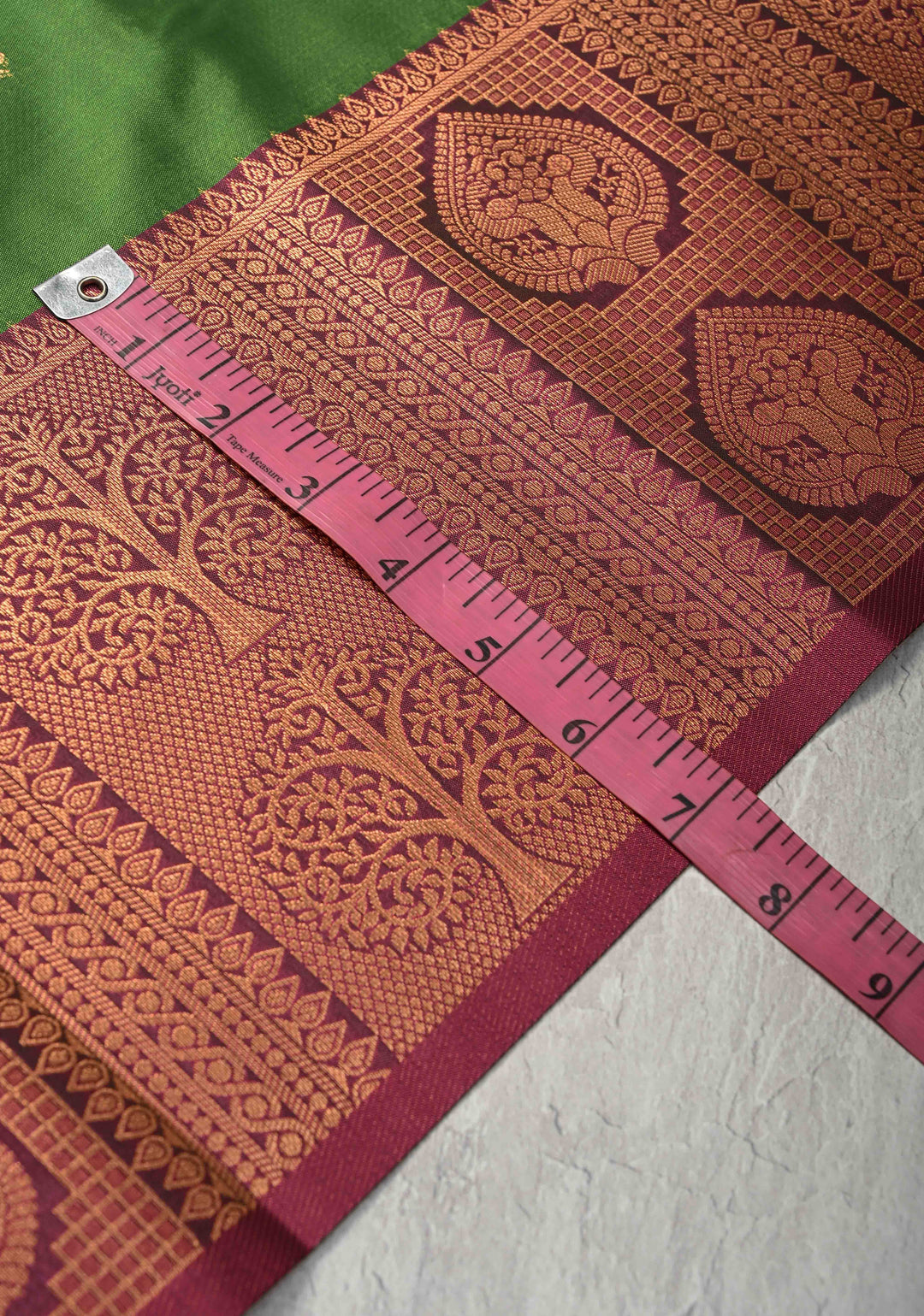 Sap Green Kanchi Semi Silk Saree with Peacock Buttas and Contrast Zari Border