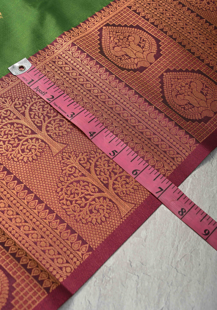 Sap Green Kanchi Semi Silk Saree with Peacock Buttas and Contrast Zari Border