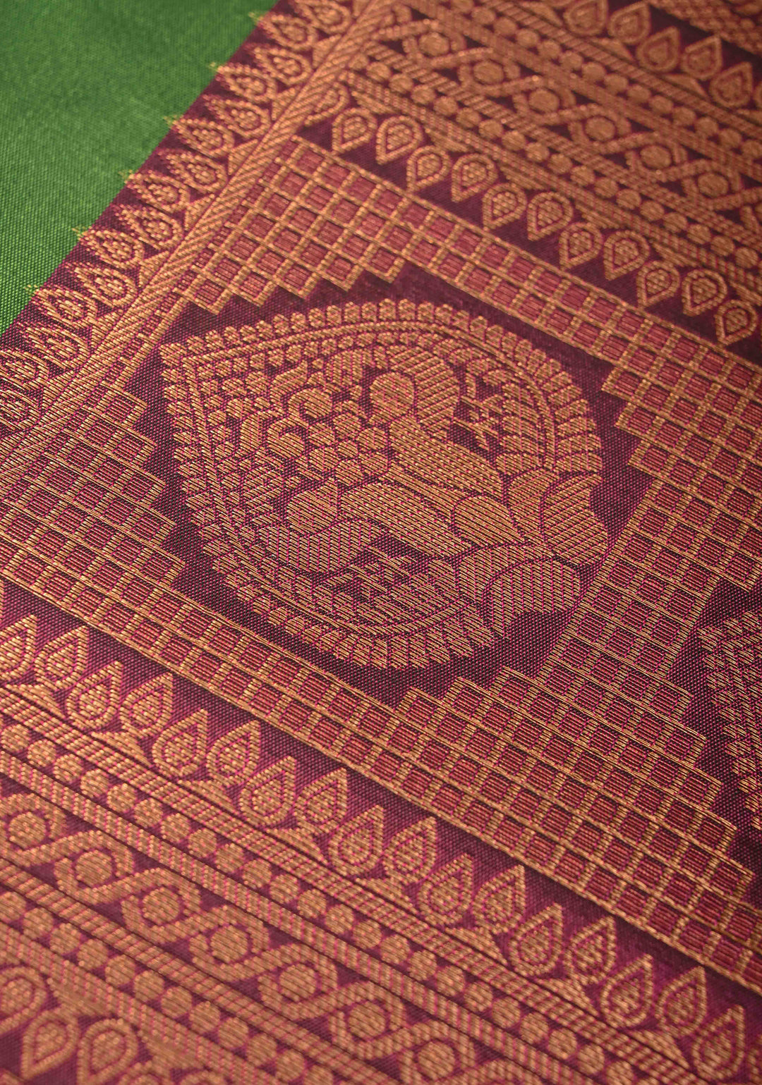 Sap Green Kanchi Semi Silk Saree with Peacock Buttas and Contrast Zari Border