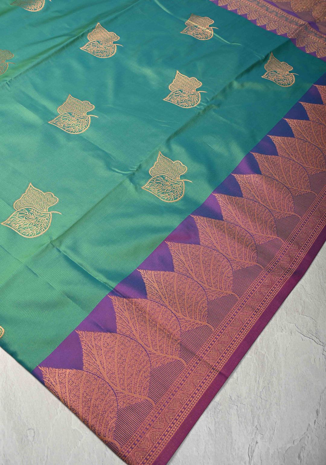 Green Dual tone Kanchi Semi Silk Saree with Leaf Buttas and Contrast Zari Border