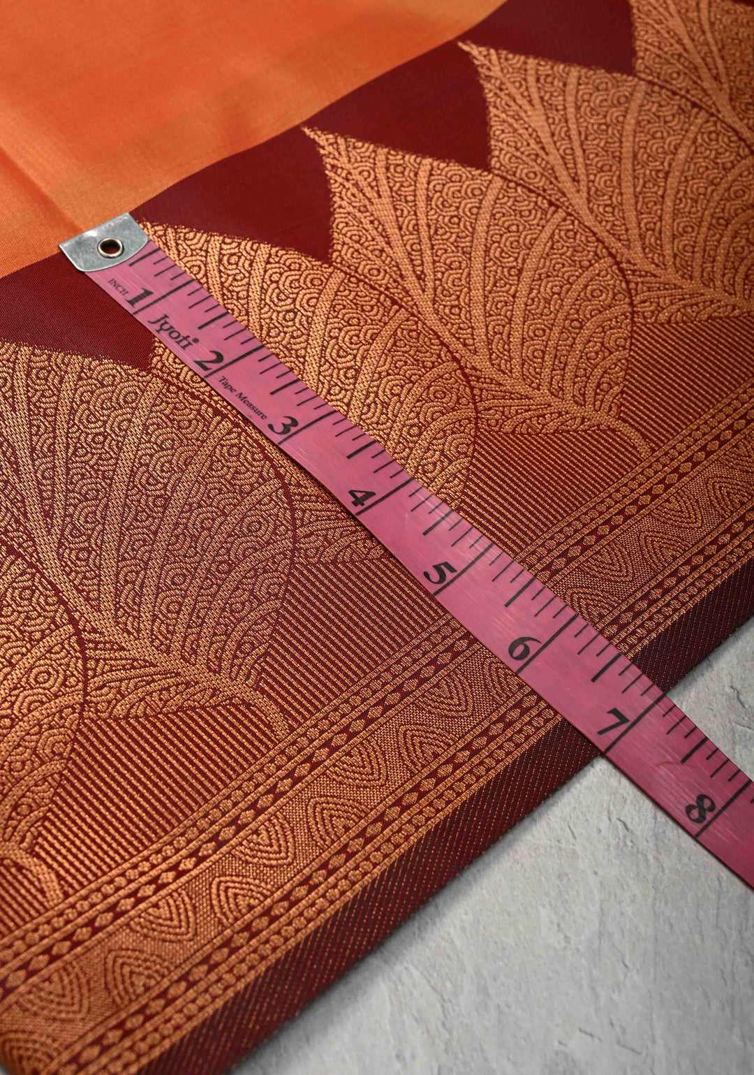 Fire Orange Kanchi Semi Silk Saree with Leaf Buttas and Contrast Zari Border