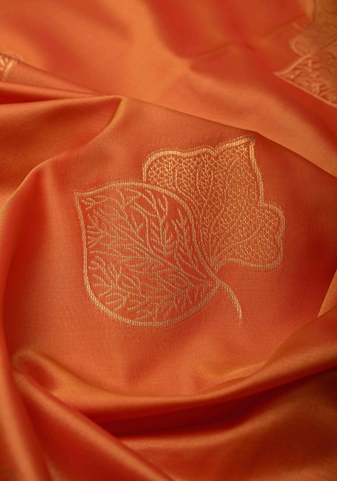 Fire Orange Kanchi Semi Silk Saree with Leaf Buttas and Contrast Zari Border