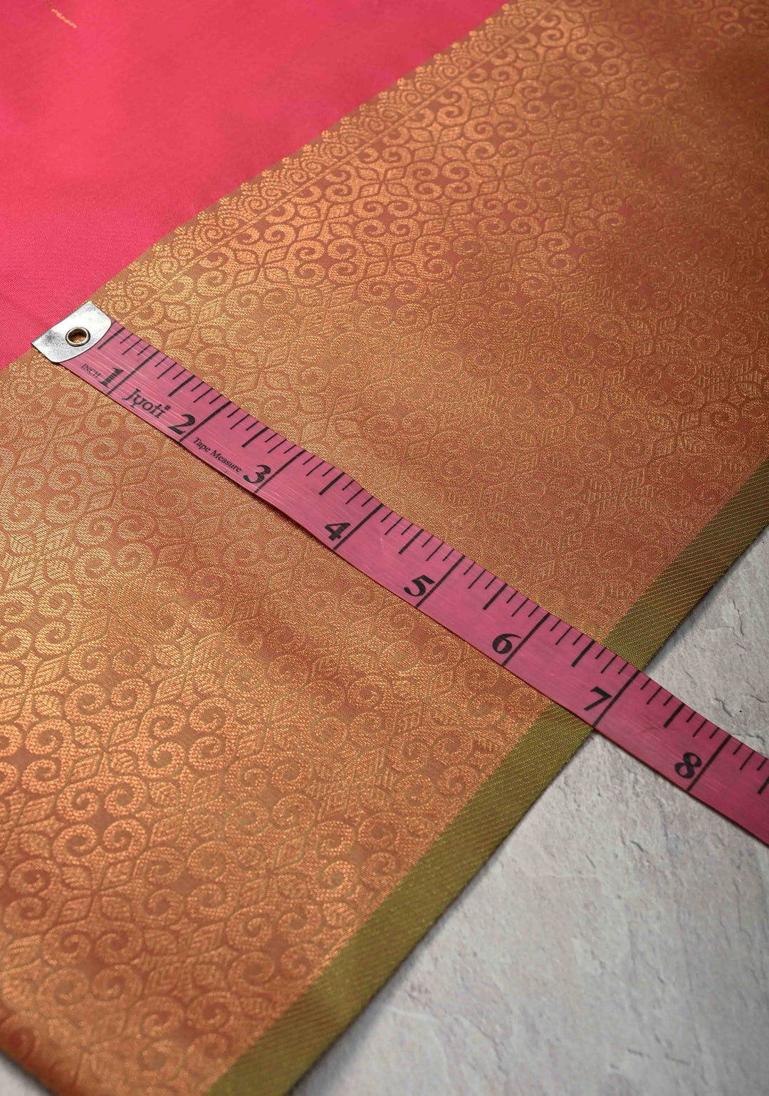 Fiery Rose Kanchi Semi Silk Saree with Meenakari Floral Buttas and Zari Border