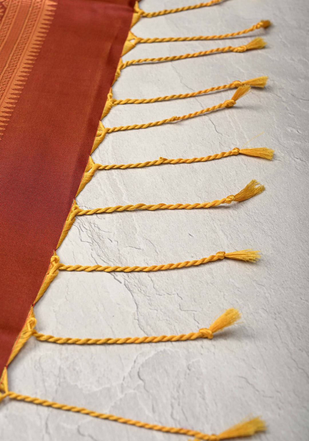 Fire Orange Kanchi Semi Silk Saree with Meenakari Buttas and Contrast Zari Border