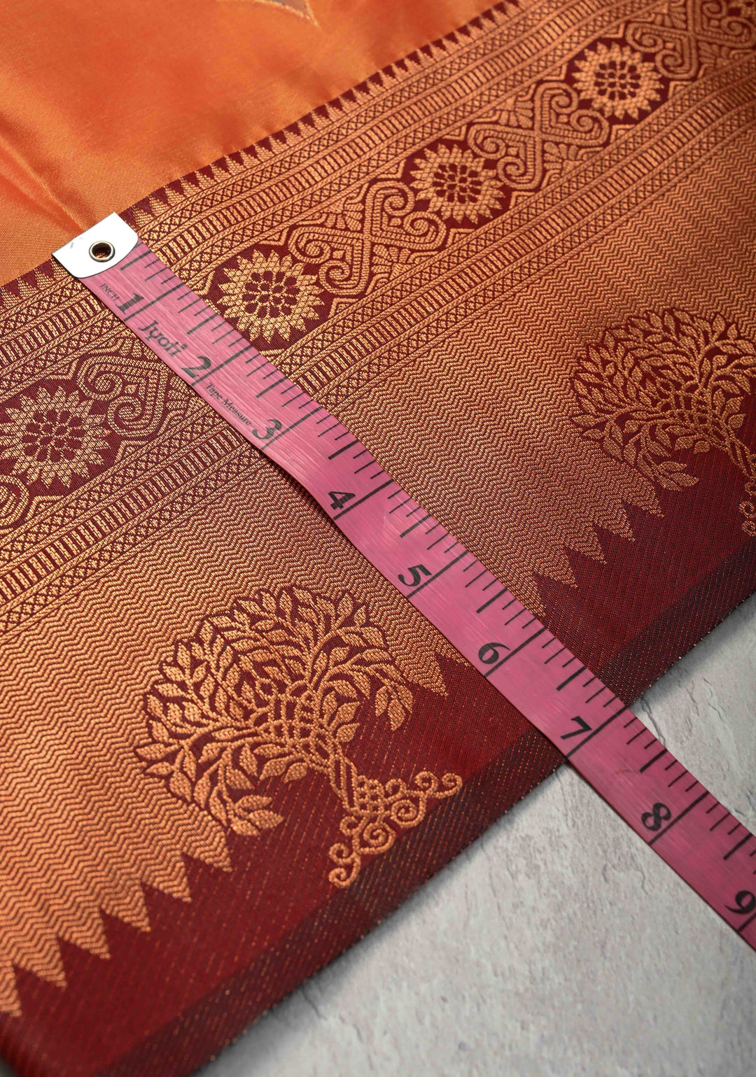 Fire Orange Kanchi Semi Silk Saree with Meenakari Buttas and Contrast Zari Border