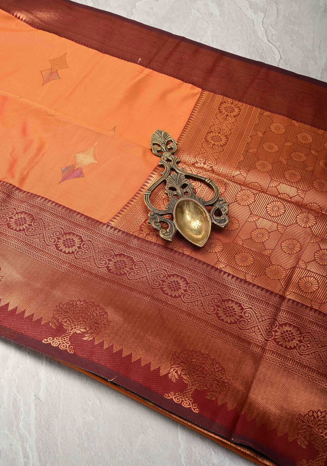 Fire Orange Kanchi Semi Silk Saree with Meenakari Buttas and Contrast Zari Border