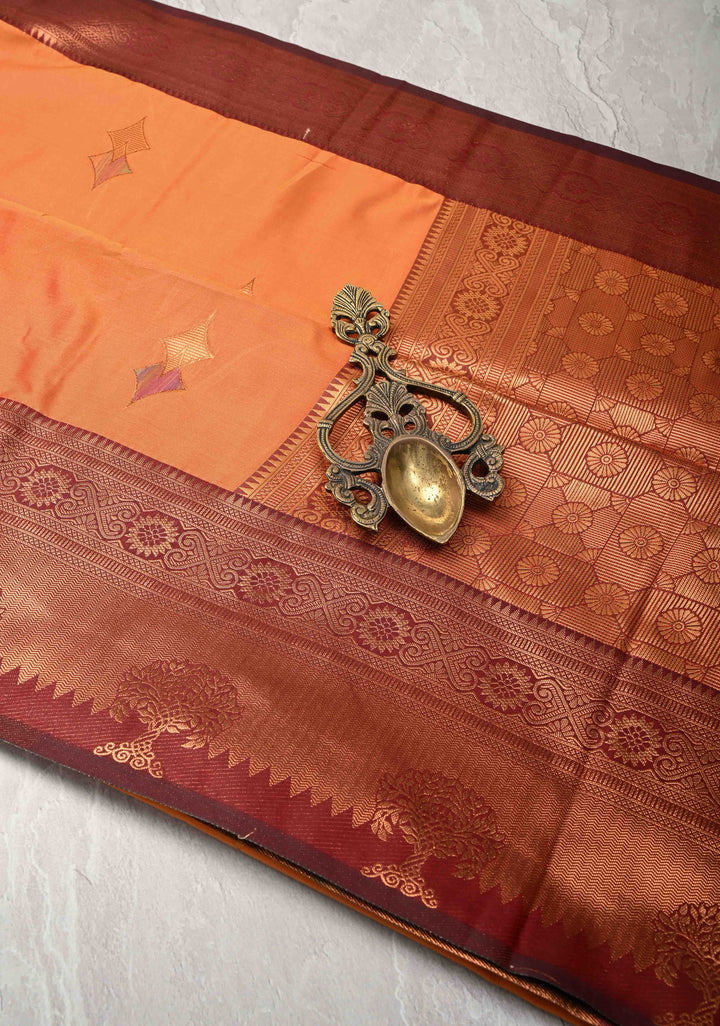 Fire Orange Kanchi Semi Silk Saree with Meenakari Buttas and Contrast Zari Border