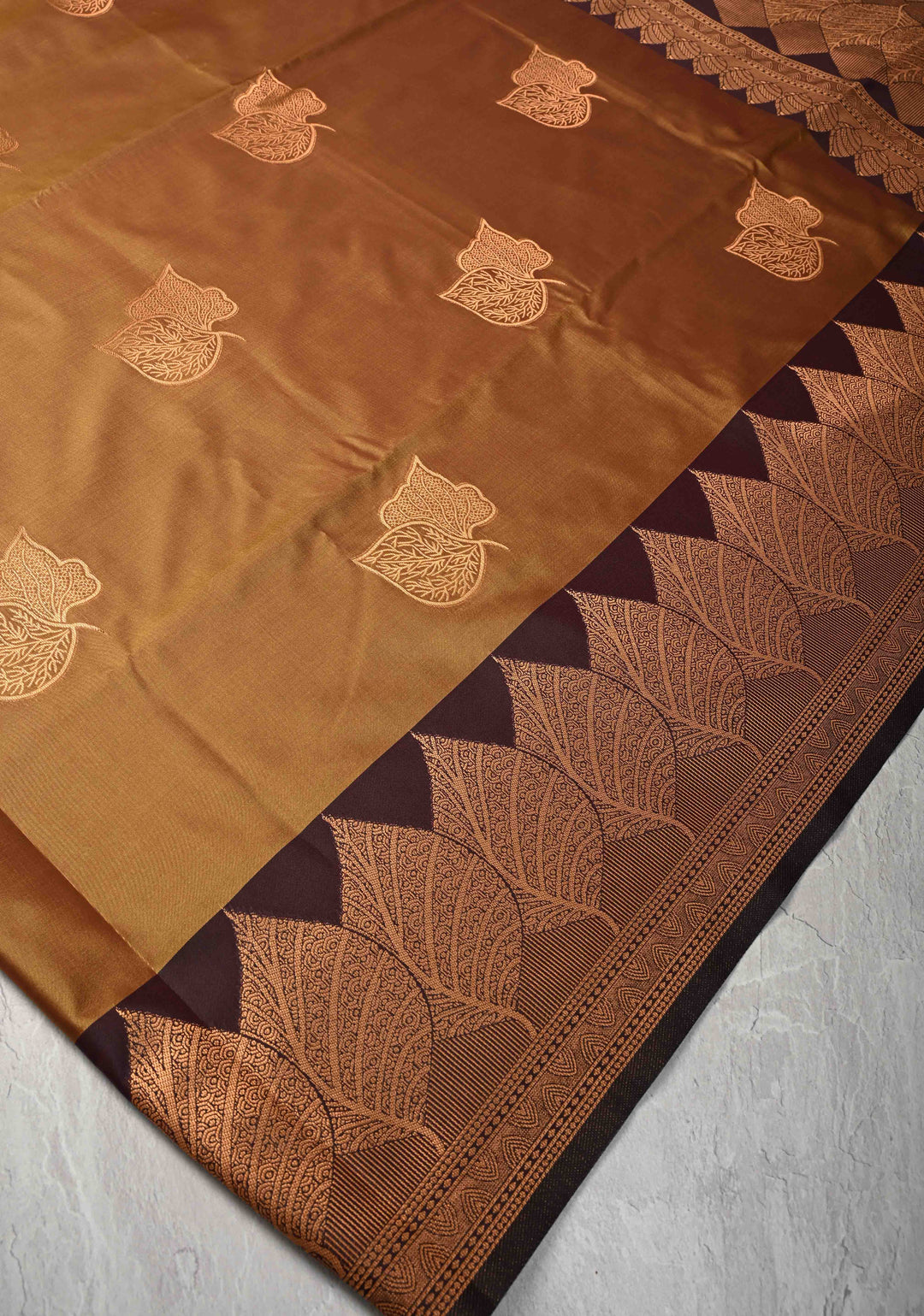 Brown Dual tone Kanchi Semi Silk Saree with Leaf Buttas and Zari Border
