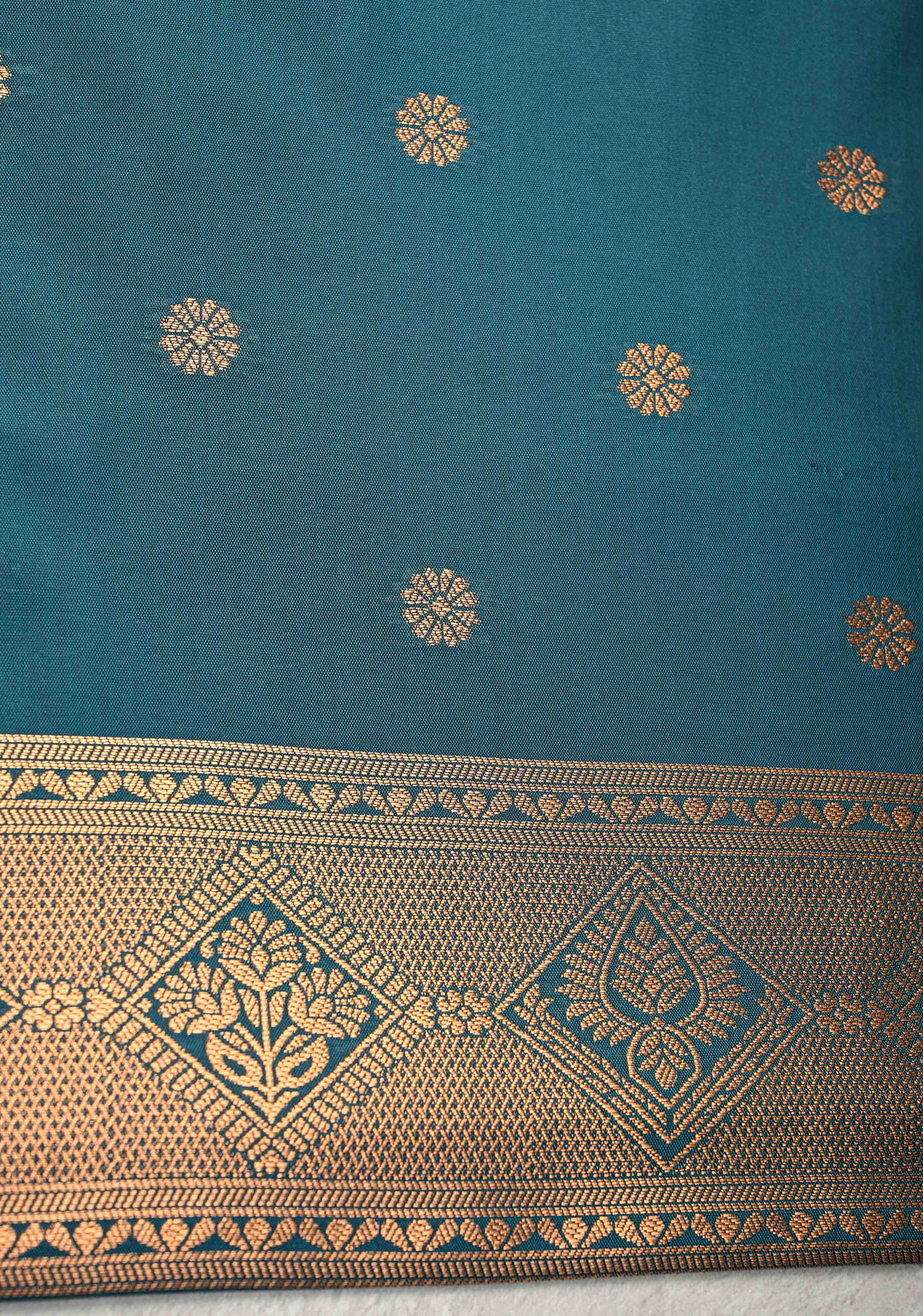 Brownish Gray Kanchi Semi Silk Saree with Alfi Floral Buttas and Zari Border