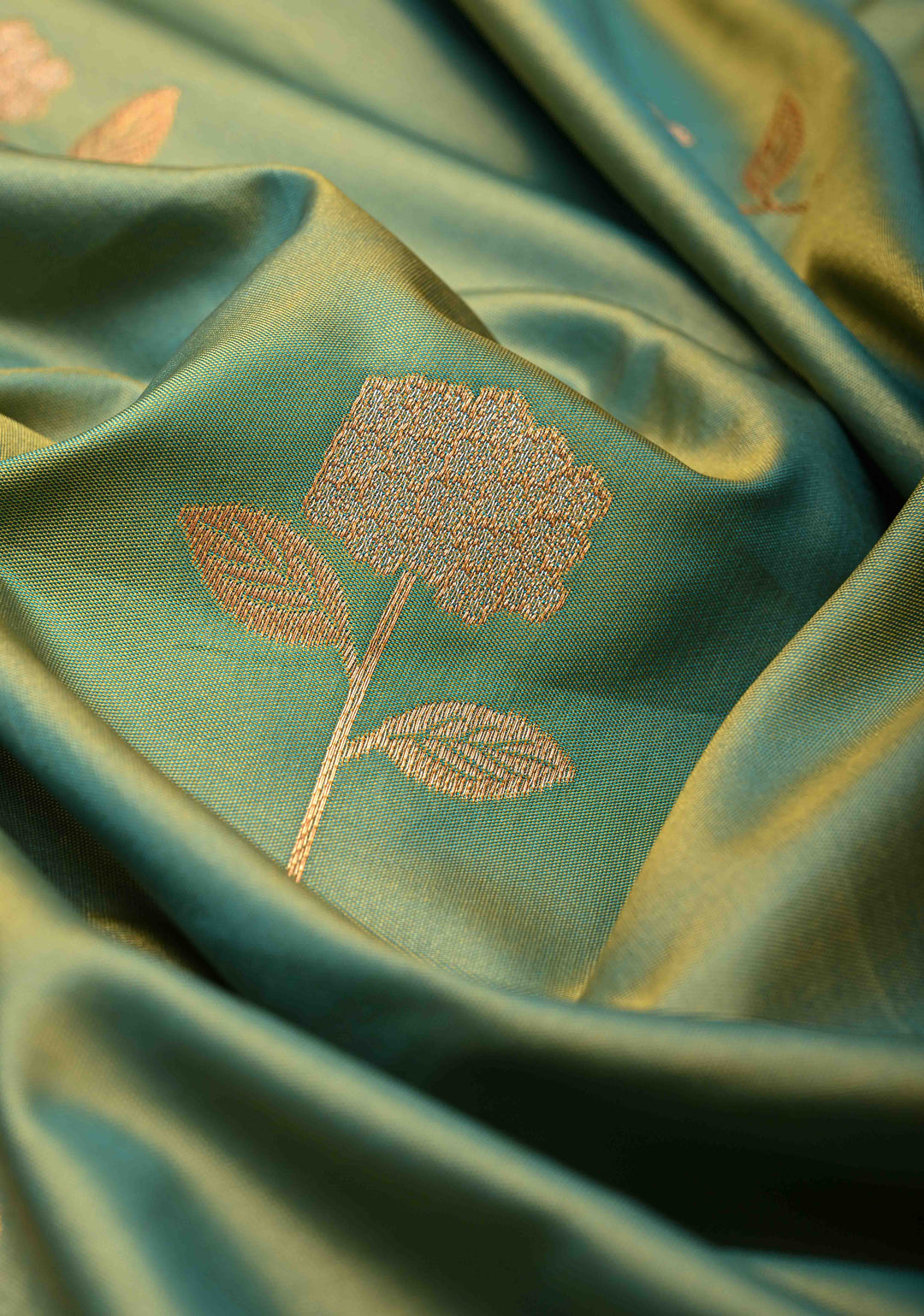 Green Dual tone Kanchi Semi Silk Saree with Alfi Floral Buttas and Zari Border