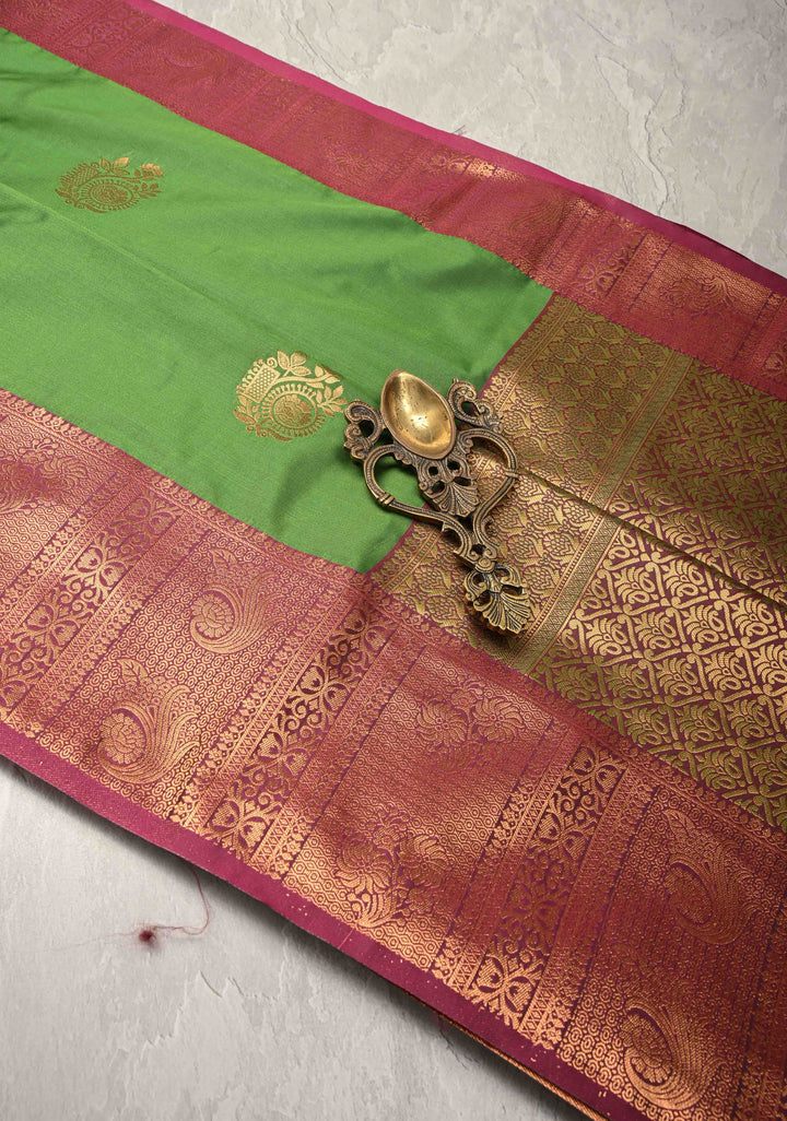 Green Kanchi Semi Silk Saree with Zari Buttas and Zari Border