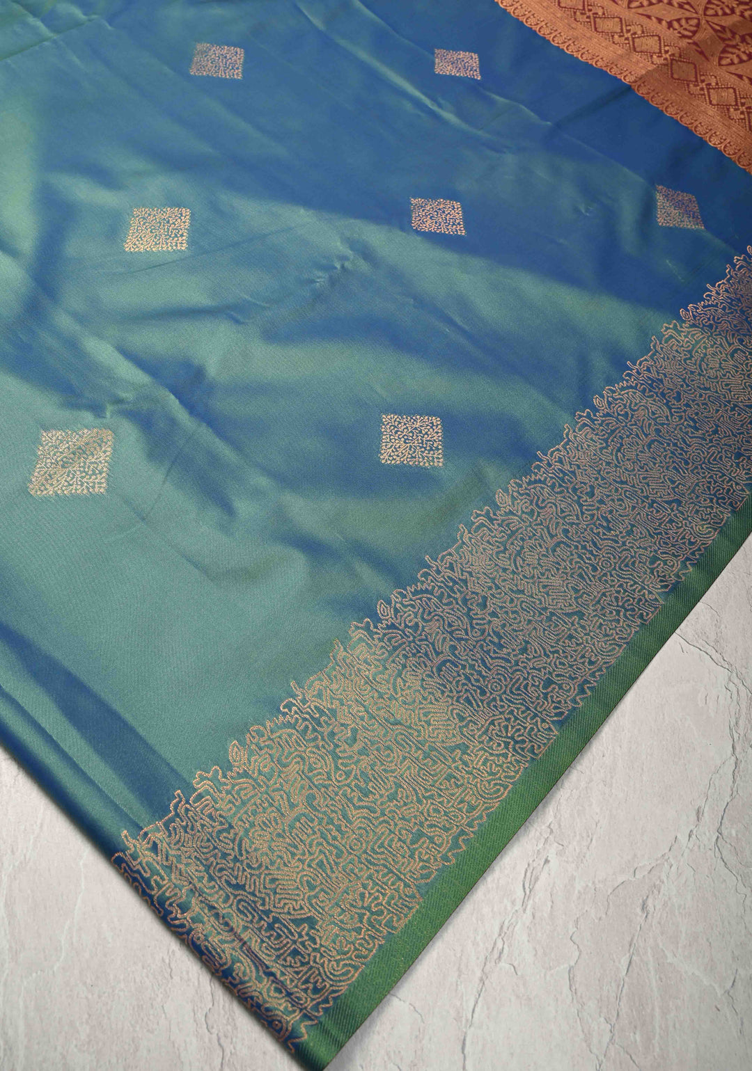 Peacock Blue  Dual tone  Kanchi Semi Silk Saree with Geometric Buttas and Abstract Zari Border