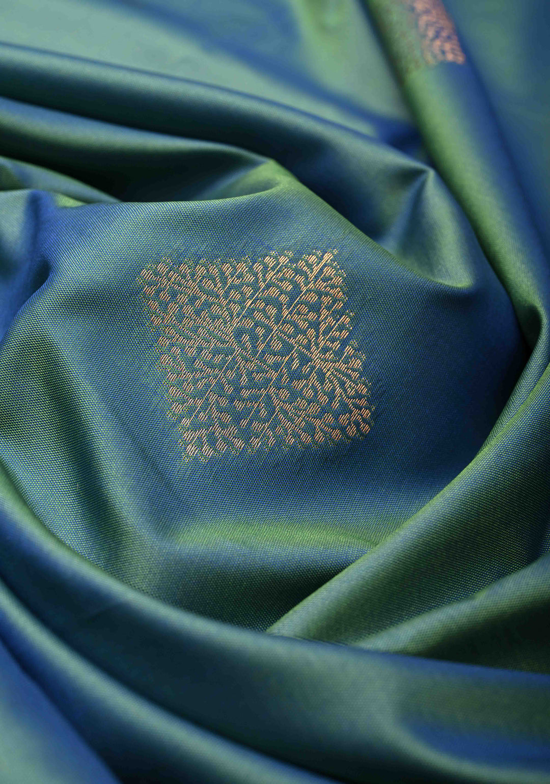 Peacock Blue  Dual tone  Kanchi Semi Silk Saree with Geometric Buttas and Abstract Zari Border