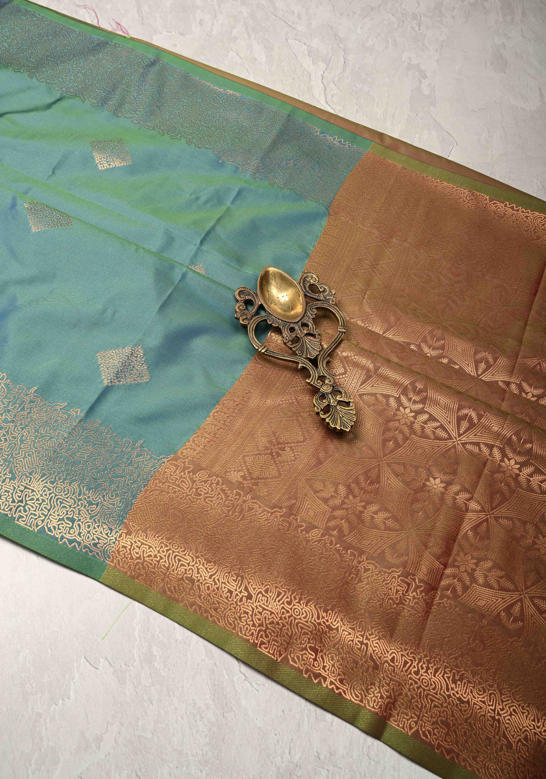 Peacock Blue  Dual tone  Kanchi Semi Silk Saree with Geometric Buttas and Abstract Zari Border
