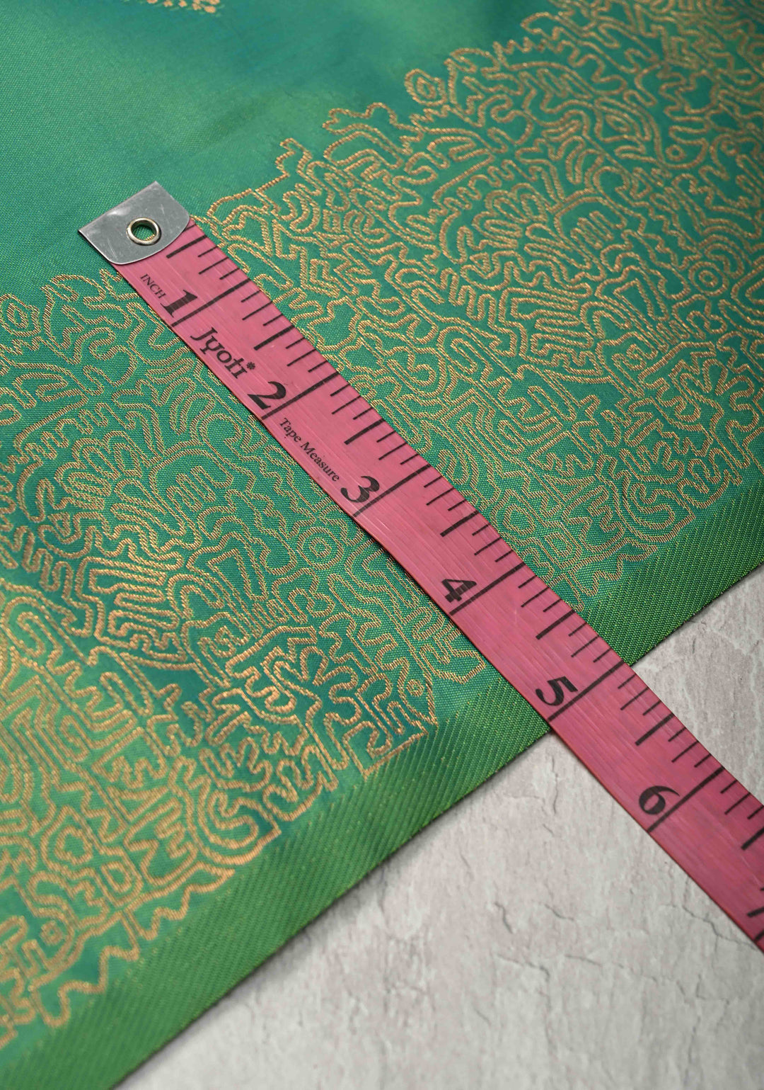 Green Kanchi Semi Silk Saree with Geometric Buttas and Abstract Zari Border