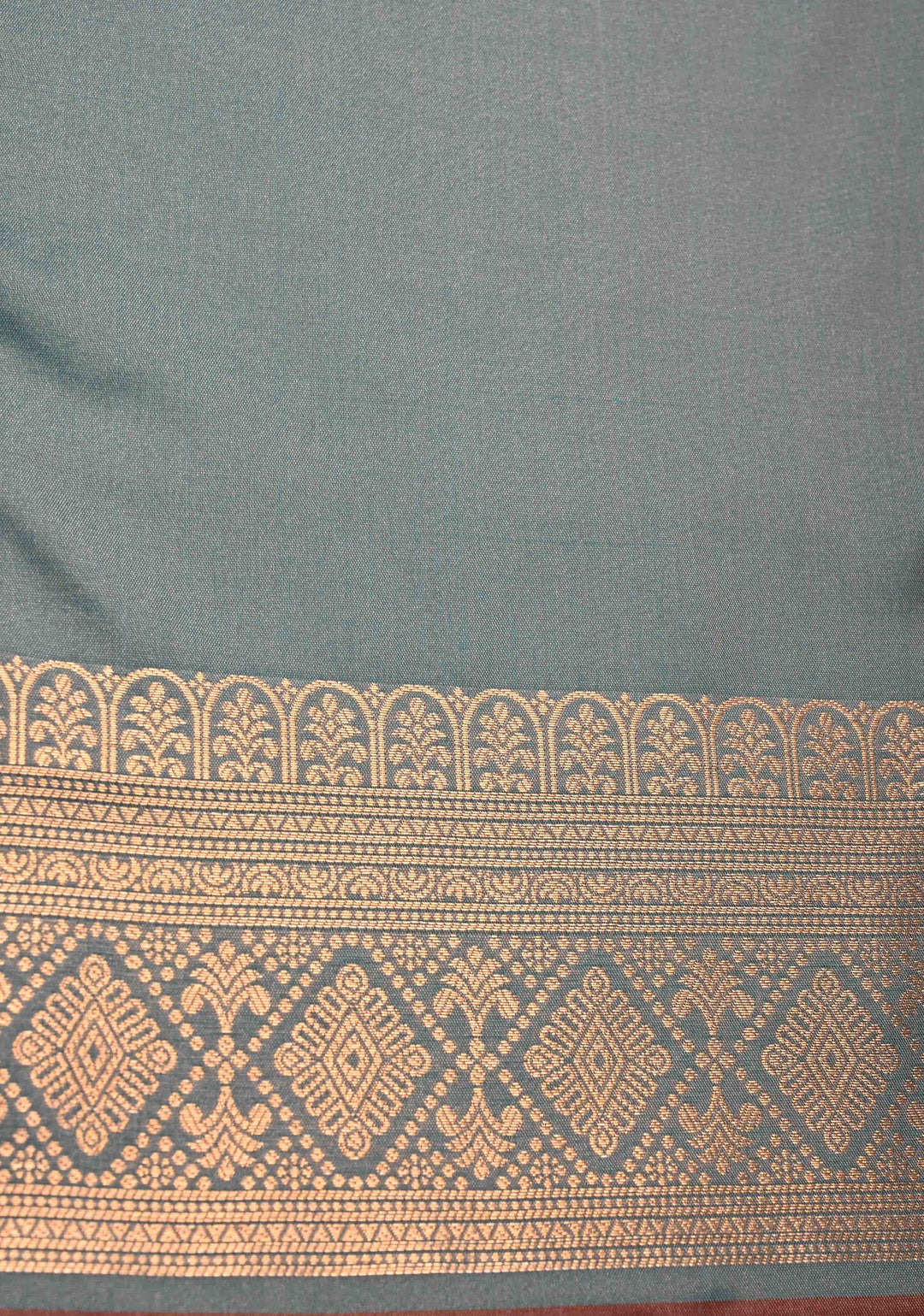 Copper Rose Kanchi Semi Silk Saree with Geometric Buttas and Abstract Zari Border