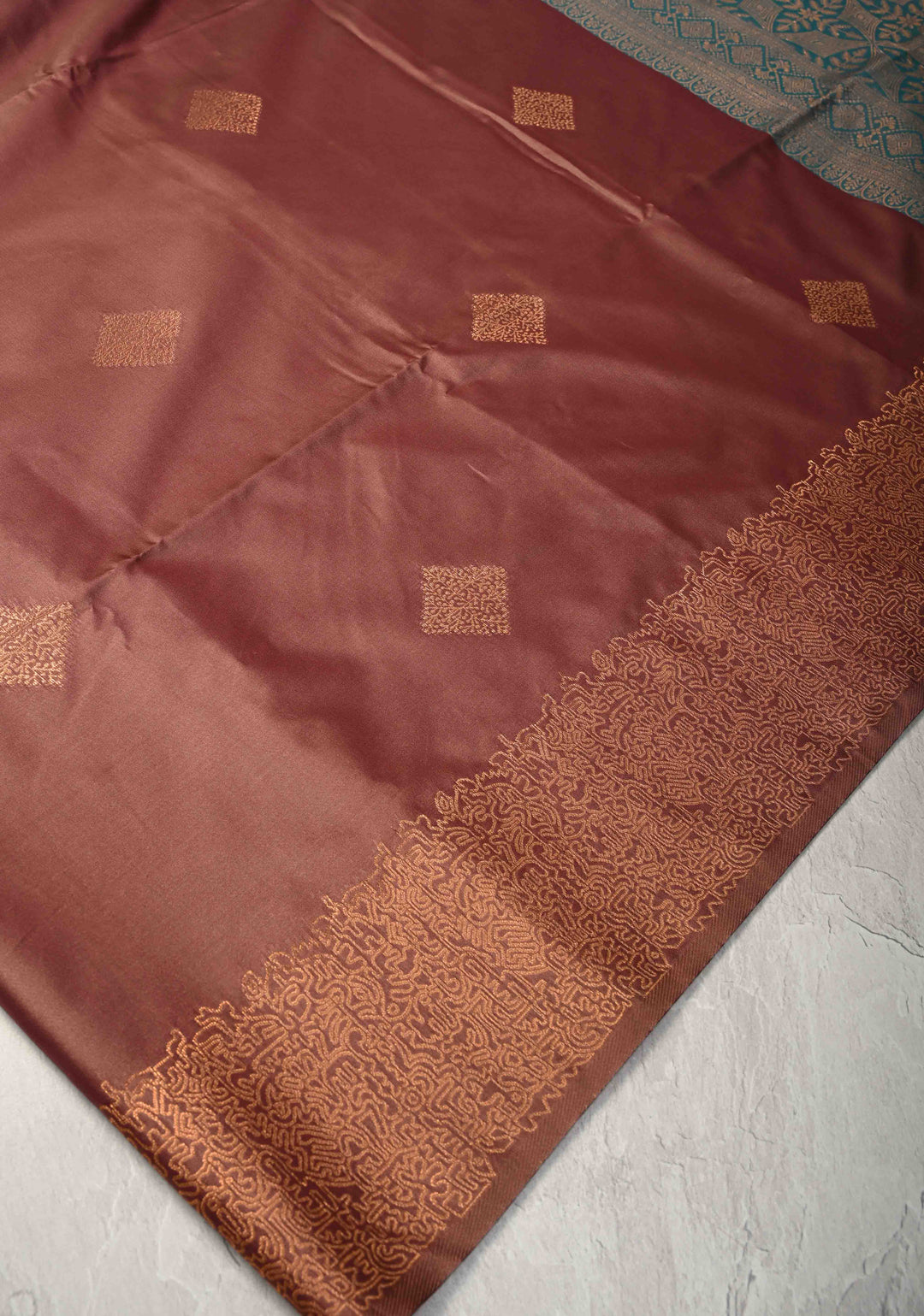 Copper Rose Kanchi Semi Silk Saree with Geometric Buttas and Abstract Zari Border