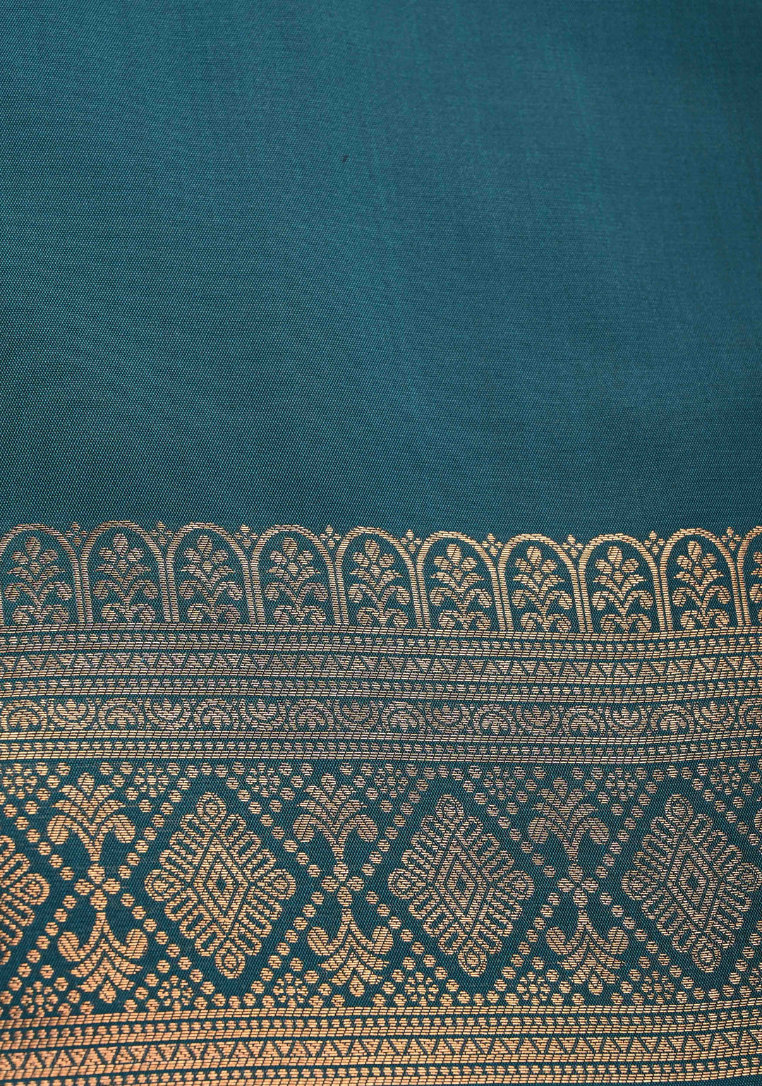 Brown Kanchi Semi Silk Saree with Geometric Buttas and Abstract Zari Border