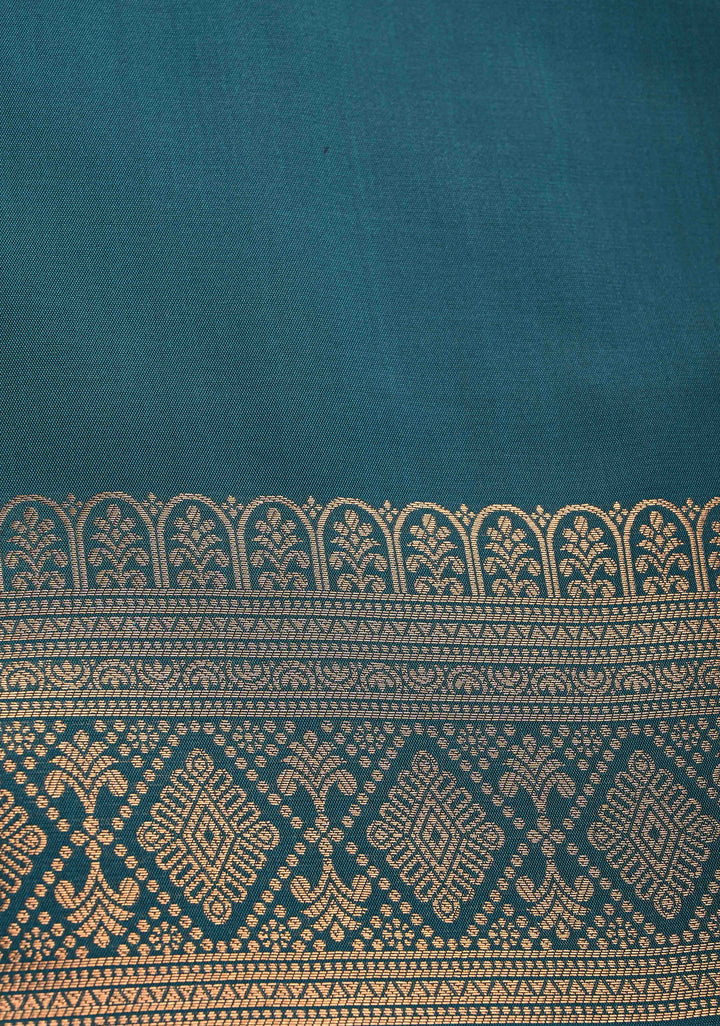 Brown Kanchi Semi Silk Saree with Geometric Buttas and Abstract Zari Border