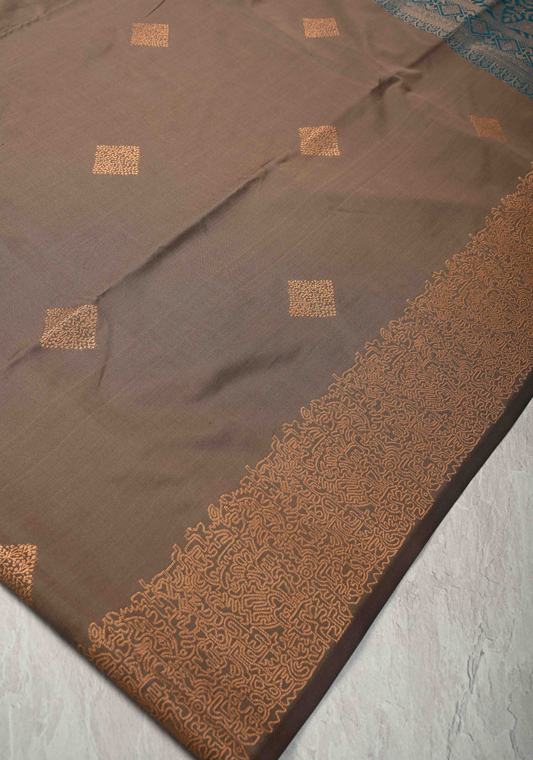 Brown Kanchi Semi Silk Saree with Geometric Buttas and Abstract Zari Border