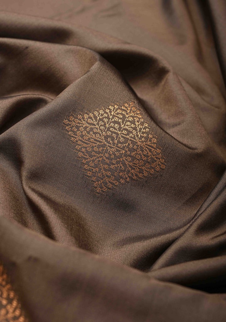 Brown Kanchi Semi Silk Saree with Geometric Buttas and Abstract Zari Border