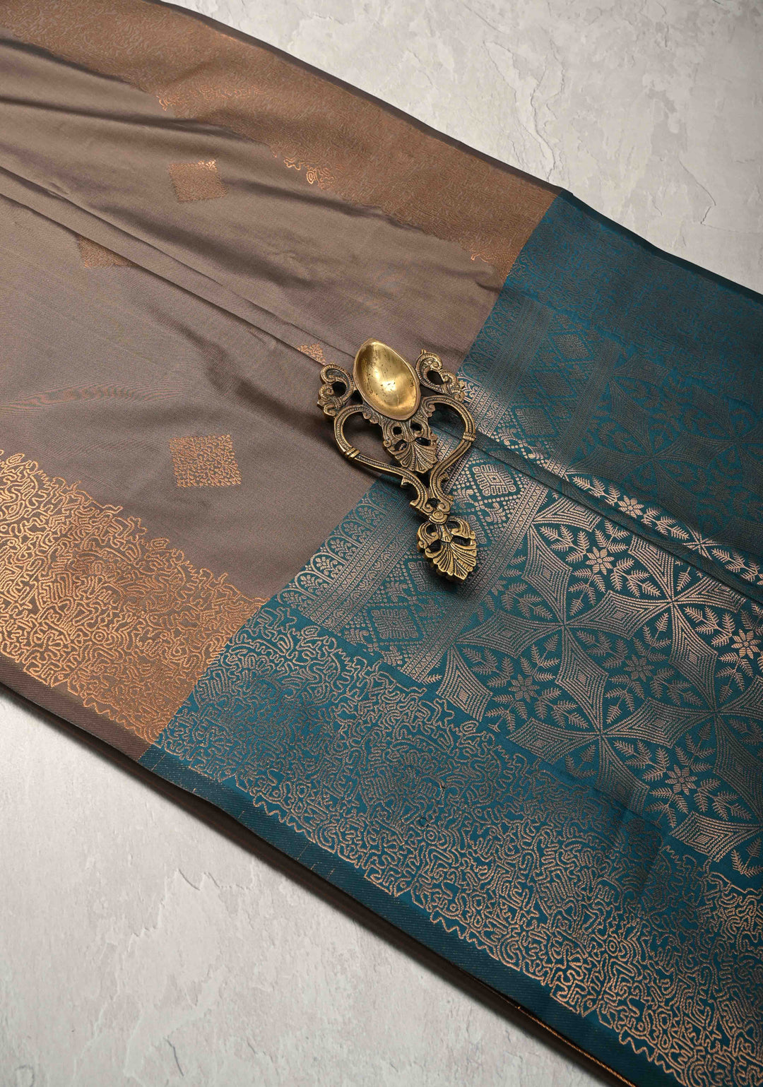 Brown Kanchi Semi Silk Saree with Geometric Buttas and Abstract Zari Border