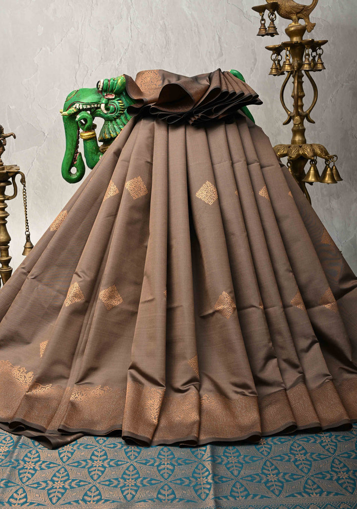 Brown Kanchi Semi Silk Saree with Geometric Buttas and Abstract Zari Border
