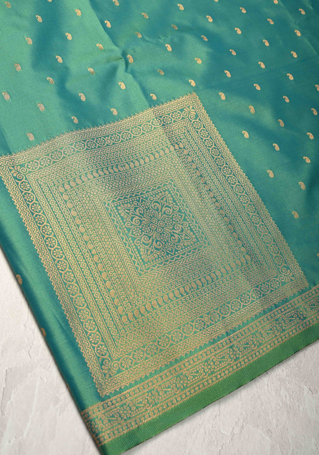 Green Dual tone Kanchi Semi Silk Saree with Paisley Zari Buttas and Geomatric Motifs on Border