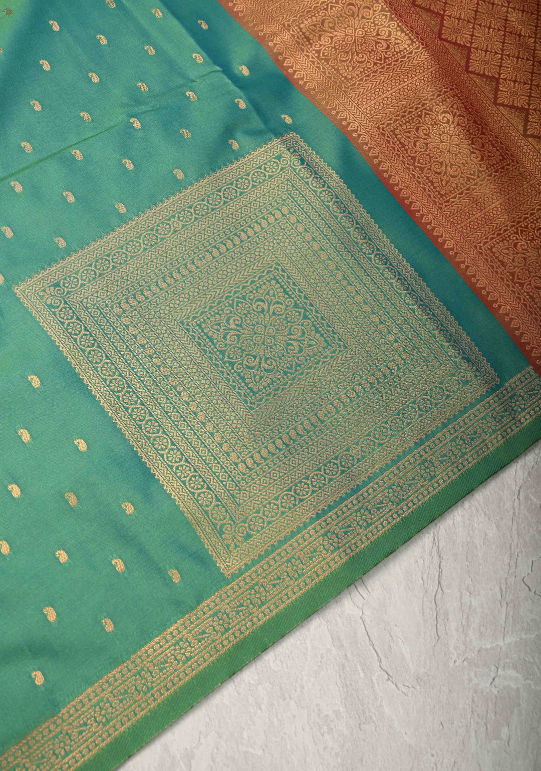 Green Dual tone Kanchi Semi Silk Saree with Paisley Zari Buttas and Geomatric Motifs on Border