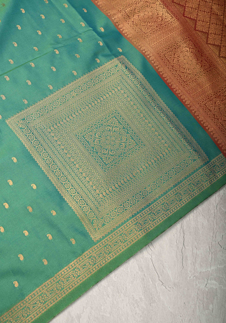 Green Dual tone Kanchi Semi Silk Saree with Paisley Zari Buttas and Geomatric Motifs on Border