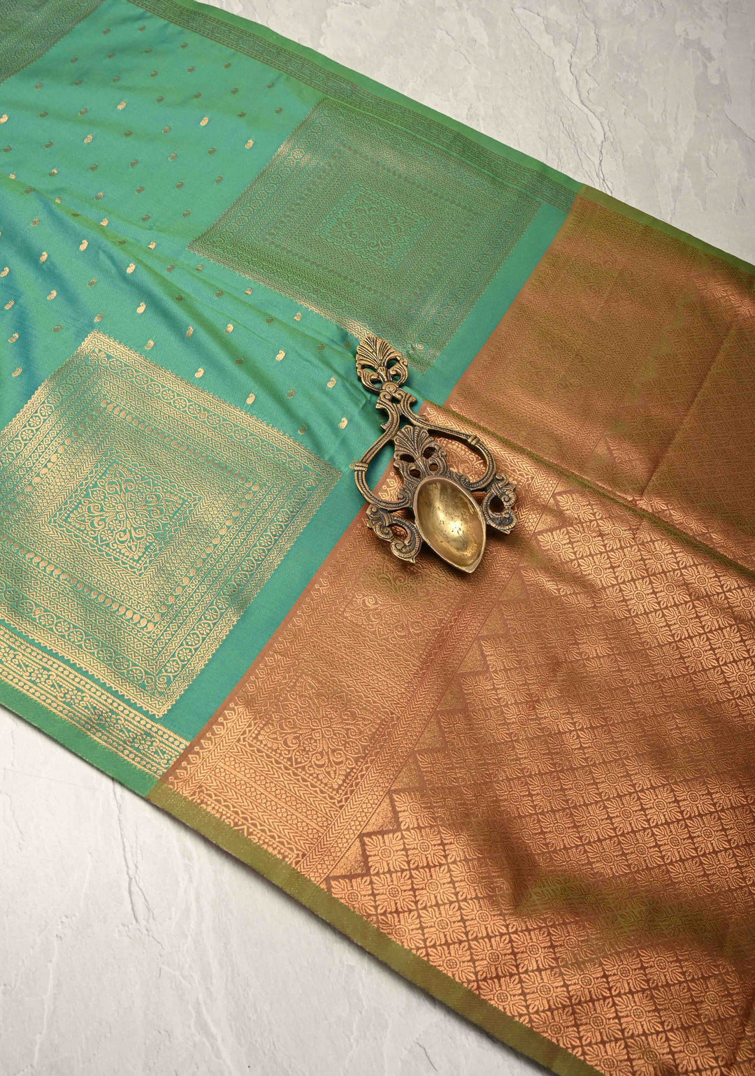 Green Dual tone Kanchi Semi Silk Saree with Paisley Zari Buttas and Geomatric Motifs on Border
