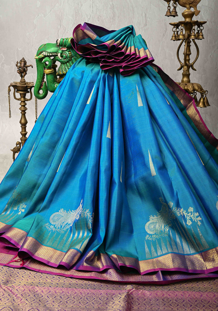 Blue and Green Dual tone Kanjivaram Pure Silk Saree with Zari butta and Peacock Floral Motif above Minimal zari Border  | SILK MARK CERTIFIED